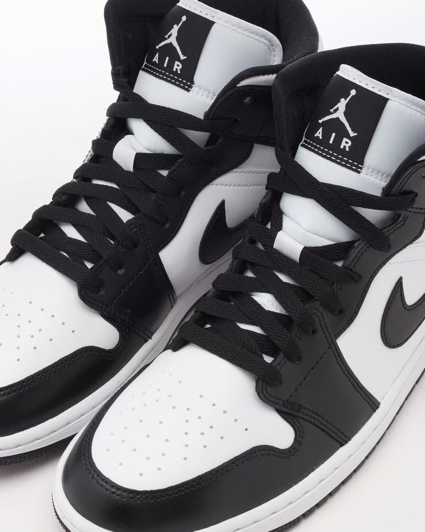 Jordan 1 Mid Black White